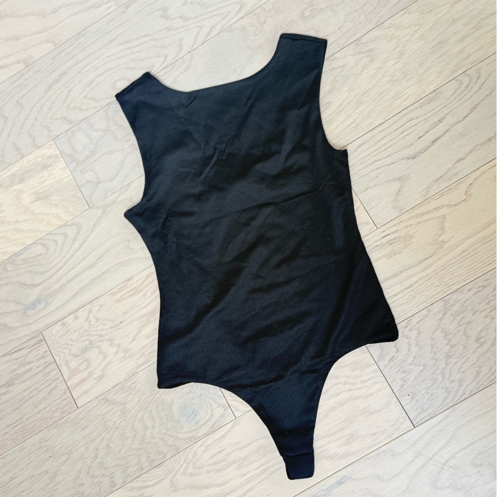 bp Black Asymmetric One-Piece Bodysuit New without tags - Never worn!